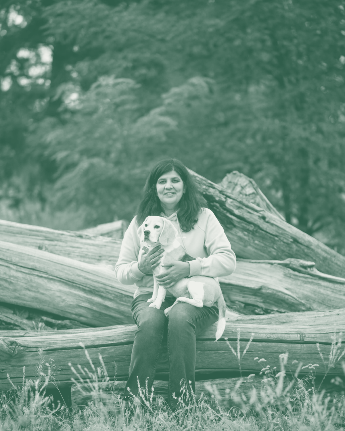 Portrait of Robyn Toor, founder of sitkastack, with her beagle Sadie in British Columbia